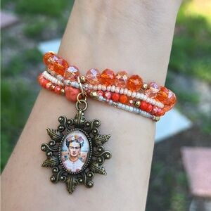 Bohemian Orange Beaded Bracelet with Vintage Charm with frida kahlo picture
